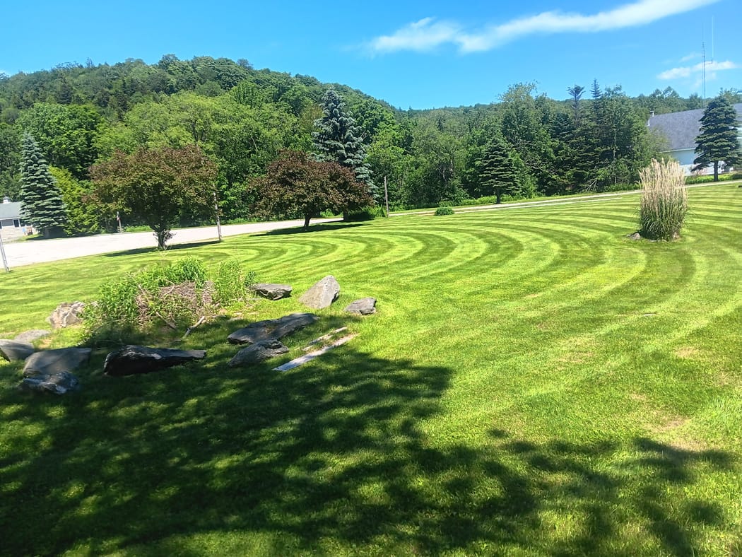 Striped & manicured lawn